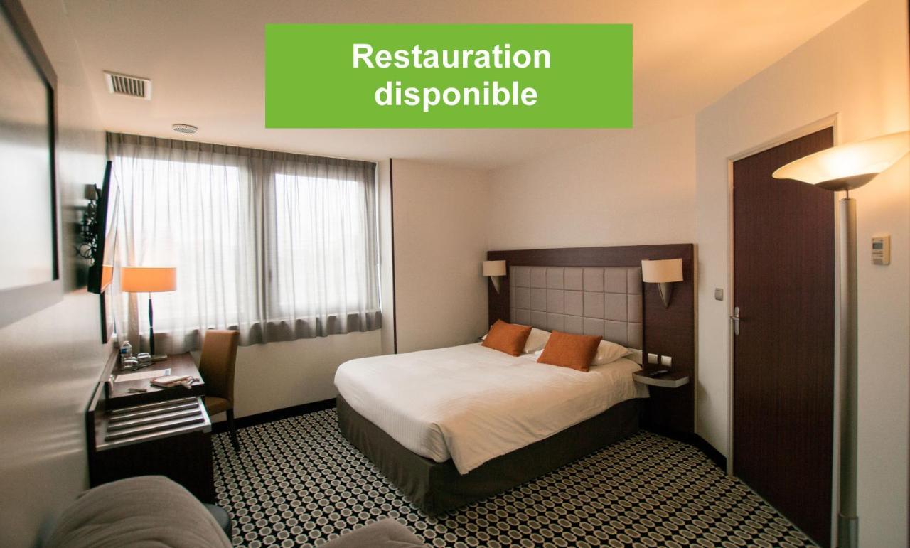 กีริอ๊าด ลิโมฌ ซองทร์ - การ์ - เอเทรียม Hotel ลิมอจส์ ภายนอก รูปภาพ