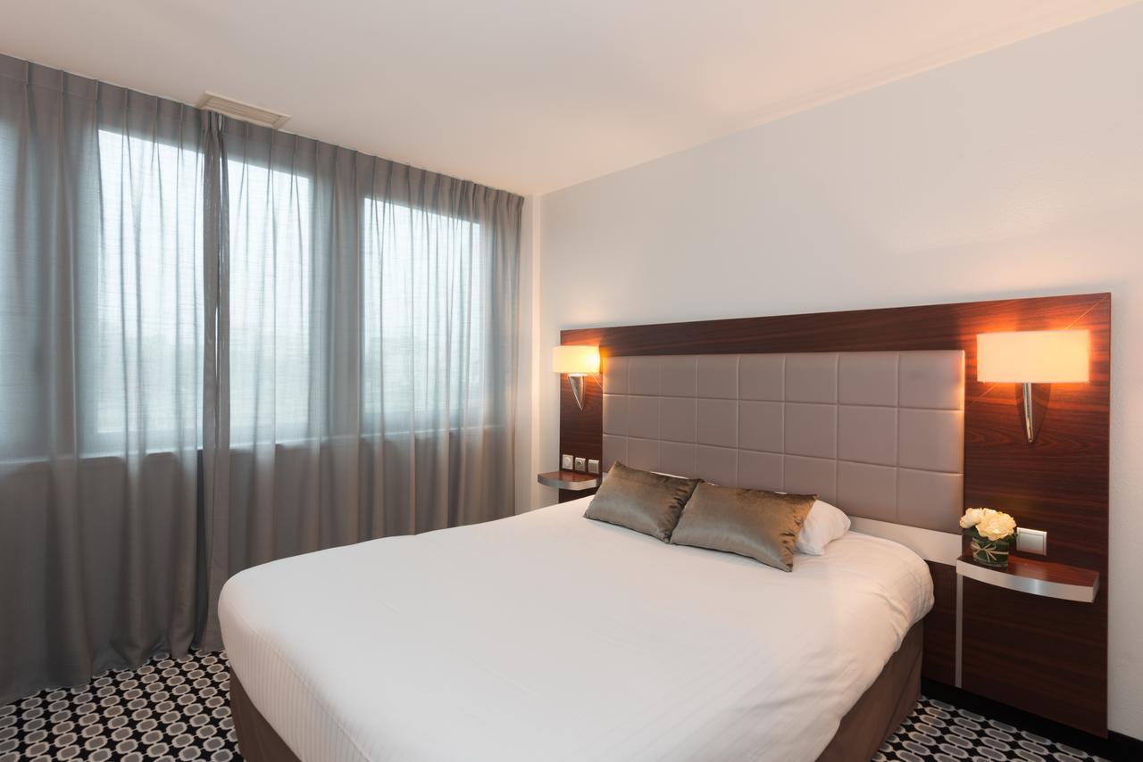 กีริอ๊าด ลิโมฌ ซองทร์ - การ์ - เอเทรียม Hotel ลิมอจส์ ห้อง รูปภาพ