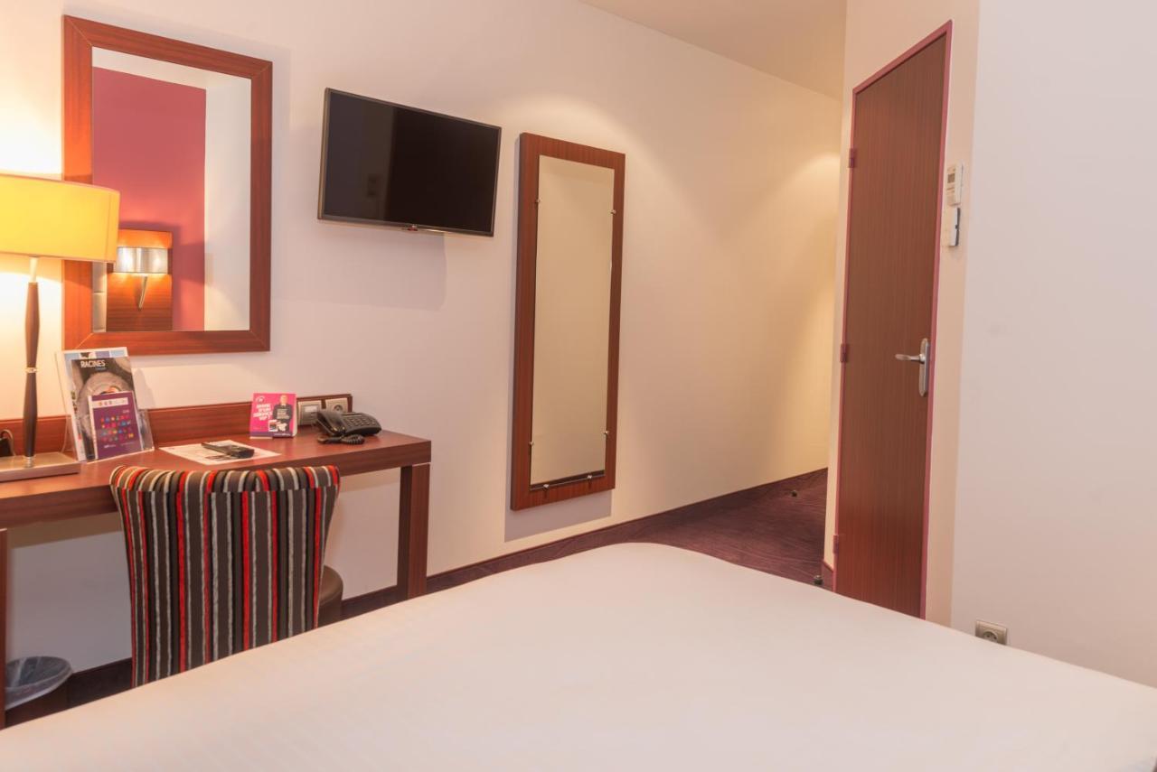 กีริอ๊าด ลิโมฌ ซองทร์ - การ์ - เอเทรียม Hotel ลิมอจส์ ภายนอก รูปภาพ