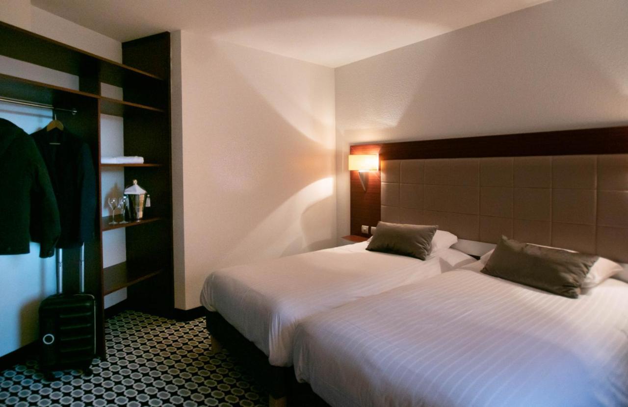 กีริอ๊าด ลิโมฌ ซองทร์ - การ์ - เอเทรียม Hotel ลิมอจส์ ภายนอก รูปภาพ